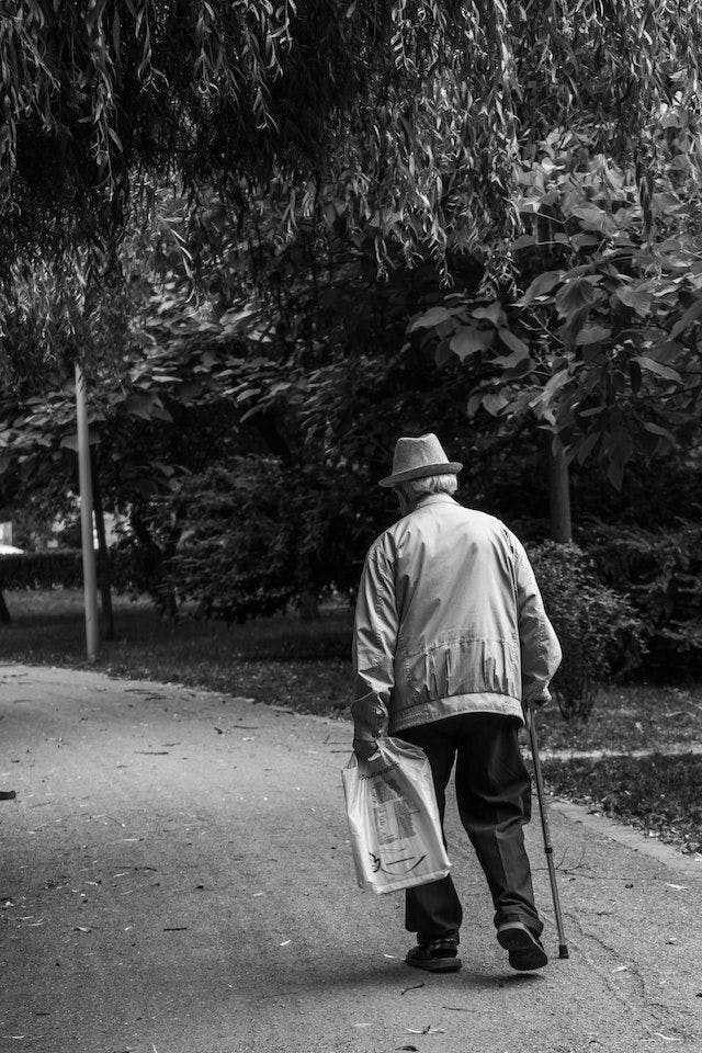 old man with walking cane